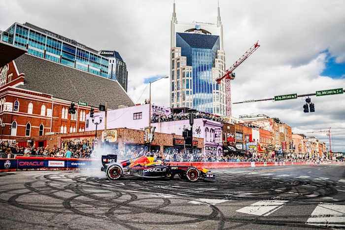 F1 driver Daniel Ricciardo tears up the street in downtown Nashville. (Photo Credit: Photog / Red Bull Content Pool)